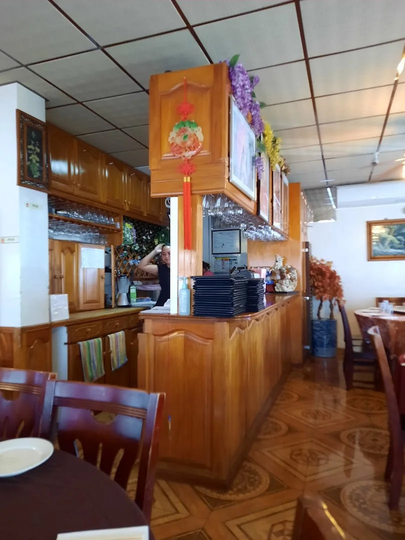 Restaurant Phénix d'Or, porc sauté aux oignons et piment doux en sauce brune